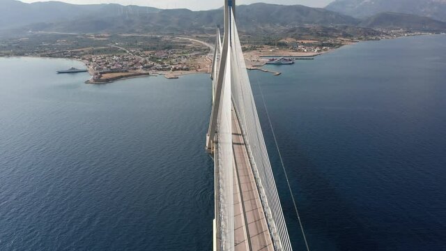 Aerial view to the right over middle of Rio Antirio Bridge in Greece