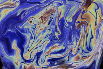 Abstract background of yellow-blue marble. The lines and waves of acrylic paint create an interesting structure. Background for web design, fabric, design,