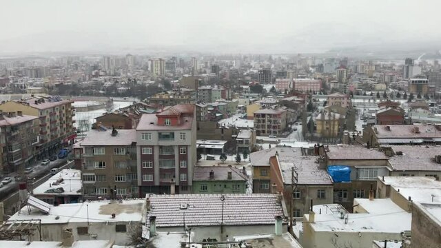 Nigde city panorama at snowy day from Nigde Castle in Central Anatolia, Turkey. Niğde Province in the Central Anatolia region of Turkey at an elevation of 1,299 mt.