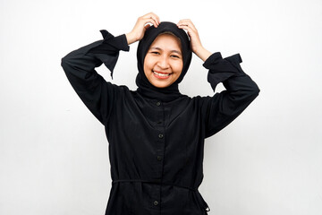 Beautiful young asian muslim woman shocked, dizzy, stressed, unhappy, many problems, want solution, with hands holding head isolated on white background