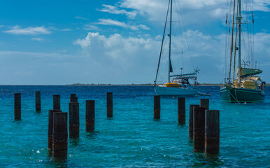 Fototapeta premium boat on the sea with pier structure