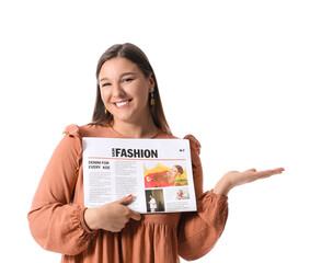 Smiling young woman with newspaper showing something on white background - obrazy, fototapety, plakaty