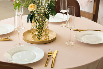 Beautiful table setting for wedding celebration in restaurant