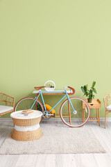 Comfortable interior of living room with modern bicycle