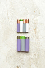 Alkaline batteries on light background