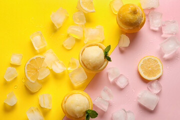 Tasty ice creams in lemon peels on color background