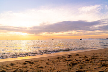 beautiful tropical beach and sea with twilight sky