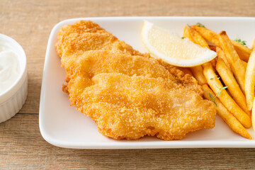 fish and chips - fried fish fillet with potatoes chips