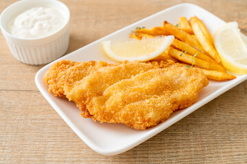 fish and chips - fried fish fillet with potatoes chips