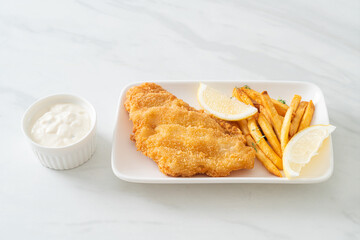 fish and chips - fried fish fillet with potatoes chips