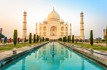 The Taj Mahal is an ivory-white marble mausoleum on the bank of the Yamuna river in the city of...