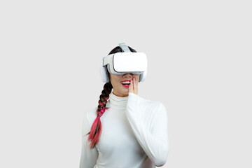Metaverse VR concepts, asian woman wearing virtual reality glasses and smiling on the white...