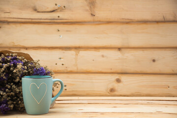 Mug on wooden background.selective focus.
