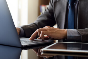 businessman working on laptop computer