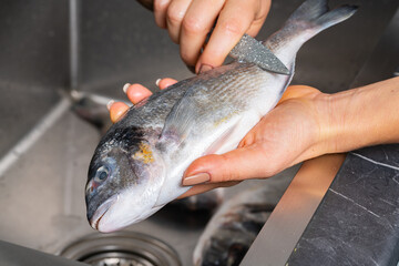 Dorado fish scales cleaning © AllFOOD
