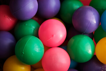 Colorful plastic balls. Selective focus.