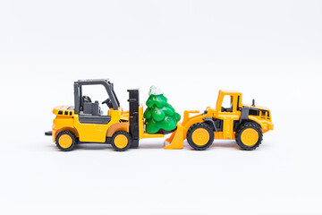 Christmas season concept, two truck with Christmas tree on white background