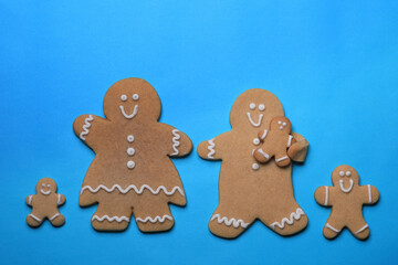 Smiling GingerBread People on Blue Background