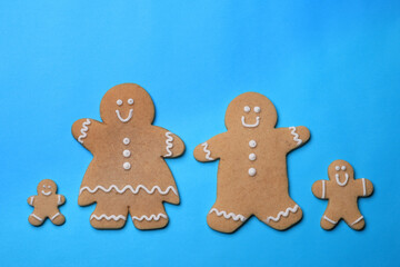 Smiling GingerBread People on Blue Background