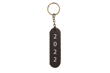 Leather keychain or keyring with 2022 word isolated on white background. Brown Color , Happy new year label accessory chain with key 