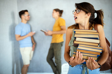 Eager student overwhelmed by studying and reading books