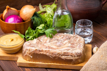 classic jellied meat served with herbs, mustard and a glass of vodka.