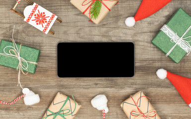 Christmas background with phone screen and Christmas decoration