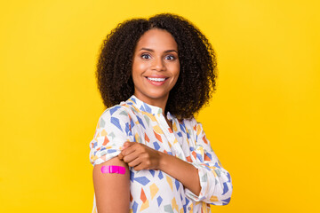 Photo of funny millennial curly hairdo lady did vaccination wear white blouse isolated on yellow...