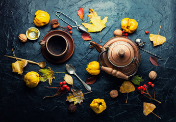 Quince tea and autumn leaves