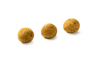 Three falafels, deep-fried balls of crushed legumes, chickpeas on a white background