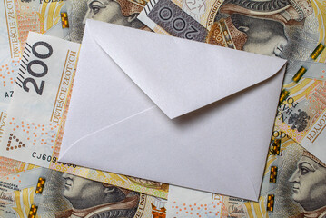 white envelope, blank note on money background, for finance and inflation