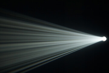 Light beam from spotlight or projector texture and black  background  and copy space - backdrop...