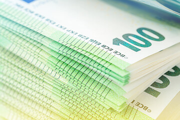 Pile of European currency. One hundred bills.