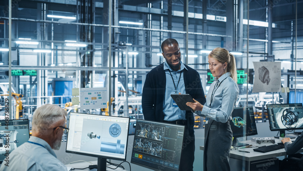 Leinwandbilder car factory office: female engineer talks with male scientist, use tablet computer to design product