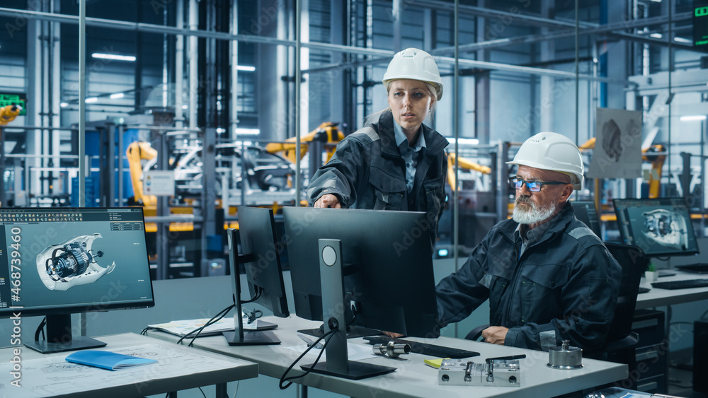 Poster car factory office: female manager talks to male automotive engineer working on computer. automated 