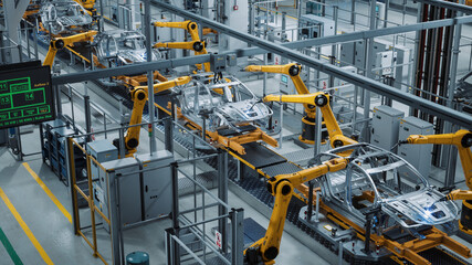 Car Factory 3D Concept: Automated Robot Arm Assembly Line Manufacturing High-Tech Green Energy...