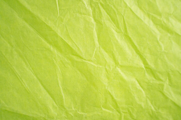 Obraz na płótnie Canvas wrinkled lime green paper texture
