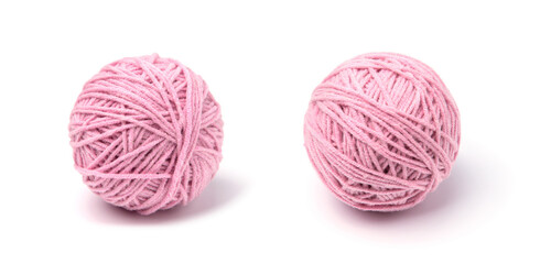 Pink ball of yarn on white background