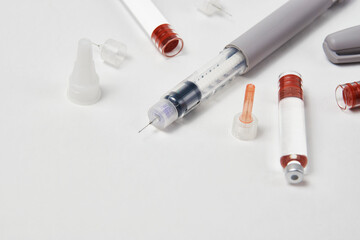 Insulin pen with insulin medicine on white background