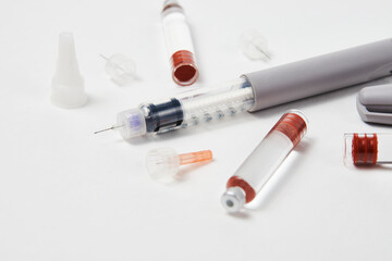 Insulin pen with insulin medicine on white background - obrazy, fototapety, plakaty