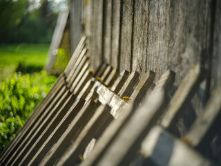 old countryside barn from wooden planks and concrete in rural area