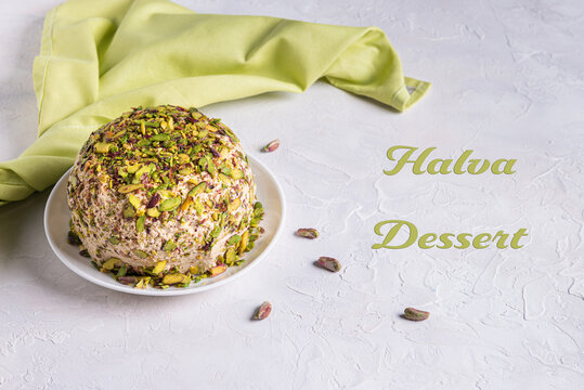 Sesame halva, green napkin and halva dessert text on white