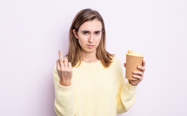 young pretty woman feeling angry, annoyed, rebellious and aggressive. take away coffee concept