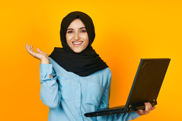cheerful woman with laptop in hands technology emotions isolated background