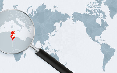 Asia centered world map with magnified glass on Tunisia. Focus on map of Tunisia on Pacific-centric World Map.