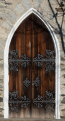 Small side door of a church in the Canadian countryside in Quebec