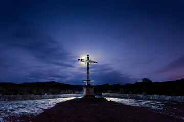 night scene of the Cross of the Fallen in the ruined village of Belchite, scene of one of the...