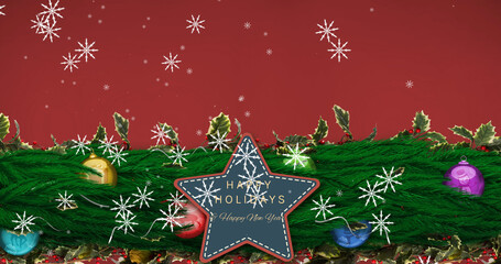 Image of snowflakes falling over christmas decorations with star, happy holidays and red