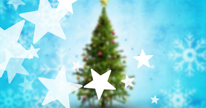Image of christmas stars falling on over tree on light blue background