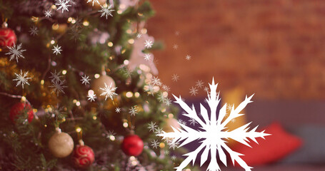 Image of christmas snowflakes falling over christmas tree